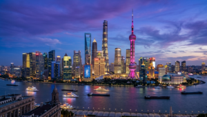Editorial illustration of the Shanghai Pudong metropolitan financial skyline across the Huangpu River